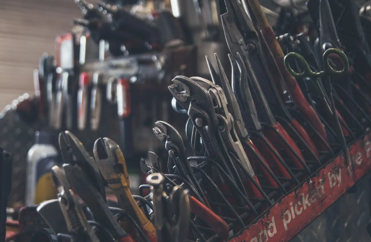 Rack of wrenches and pliers organized inside the service van